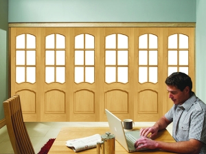 Freefold Riveria (clear bevelled glass) Oak Internal Folding Sliding Doors